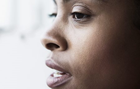 Female face with dark skin